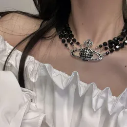 Collane con ciondolo Il nuovo diamante pieno di tre strati di cristallo nero dell'Imperatrice Dowager Vivian grande Collana Saturno Dipartimento scuro personalizzato con catena corta