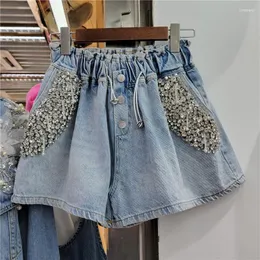 Kvinnors jeans kvinnors streetwear mode denim shorts kvinnor hög midja pärlor lapptäcke avslappnad kort feminino lös all-match sommar