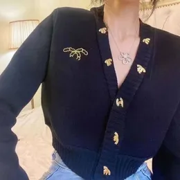 女性のVネックニットロゴ刺繍シングル胸部ボタンルーズセーターカーディガンSMLXL