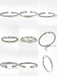 Bracciale di design Dy Designer di lusso intrecciato con perla testa Uomo Donna Moda Versatile braccialetti intrecciati Gioielli Regali di nozze placcati in platino