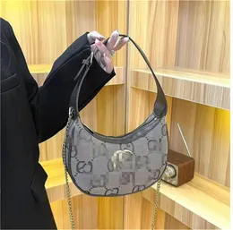 2023 Designerskie torby na ramię worka damska sprzęgło Crossbody mody z magnetycznym przymocowaniem odpinanym regulowanym torebkami z paskiem na ramię A002