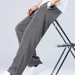 Męskie spodnie Nowe moda mężczyźni luz lodowy jedwabne spodnie wiosna letnia streetwear męski swobodny joggery sportowe spodnie sznurkowe sprężyste spodnie talii