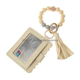 Bomboniera Us Stock Pu Bracciale in pelle Portafoglio Portachiavi Nappe Bracciale Portachiavi Porta carte Borsa Sile Portachiavi con perline Portachiavi Drop Dhbnd