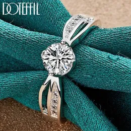 Anéis de casamento Doteffil 925 prata esterlina completa aaa zircon anel redondo para mulher moda casamento noivado festa charme jóias q231024