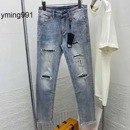 Embroiere Washe Jeans 23 nya bokstäver enim byxor eserer byxor ol hål små straiht jeans män kvinnor tunn sektion