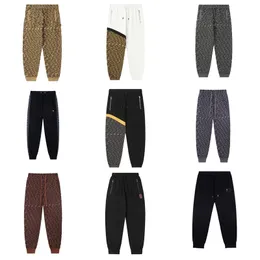 Calça de moletom masculina casual hip hop feminina carta impressa masculina solta e confortável calças com cordão outono e inverno design conforto joggers sweatpants