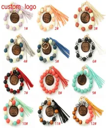 Party Favor Leopard Wood Beads Bracelet Keychain Women Leather Tassel Wristlet Key Chain for gift MAMA Letters WLL17387729394