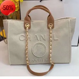 Designer Grote capaciteit Strandtassen Luxe parel tote aan zee dames schouder handtassen boodschappentas Mode Plunjezakken handtas portemonnee CH05051