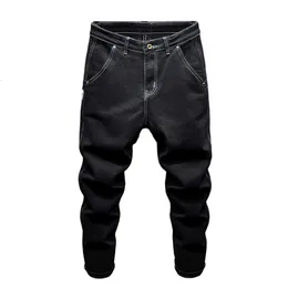 Czarne dżinsy dla mężczyzn luźne fit stretch workowate szerokie legalne dżinsowe spodnie duże streetwearne jean homme modne kowboje