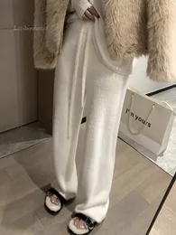 Spodnie damskie Capris miękki woskowy norek wełna dzianinowe spodni dla kobiet jesień i zima gruba garbata długość podłogi koreańskie 231026