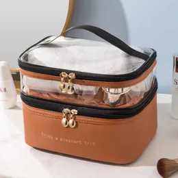 Makyaj torbası su geçirmez ve şık seyahat çanta taşınabilir büyük kapasiteli depolama torbası düz renk PU şeffaf çift katmanlı yıkama torbası 231015