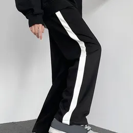 Calças masculinas combinando com cores casuais versáteis elegantes cintura elástica esportiva listrada para primavera/outono