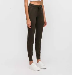 L89 spandex yoga jogger dragstring med ficksportbyxor skjuter upp gymkläder kvinnor fitness tights femme hög midje legeringar jog3144388