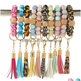 Sile New Beads keychain tassel bracelet tavor wood head key ring handbag charms women المجوهرات الهدية الهدية تسليم Dhkjx