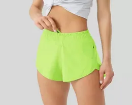 Faixa de verão que 25 polegadas solta respirável secagem rápida esportes shorts women039s calças de yoga saia versátil casual bolso lateral 5853598