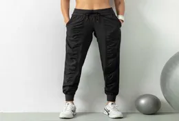 Yoga pantolon çekiliş elastik bel joggers gevşek uyumlu nefes alabilen spor kıyafetleri kadın spor pantolon koşu fitness cebinde 9384938 üzerinde
