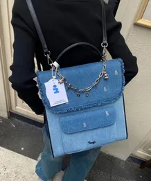 23ss moda nicho tagir novo mini bloco mochila de couro denim tecido mochila ajustável livro coreano inclui corrente