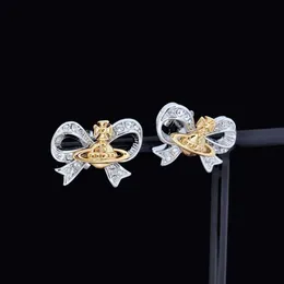 Bijoux vivian boucles d'oreilles Western impératrice douairière fil nœud papillon saturne boucles d'oreilles femme Vivian frais doux