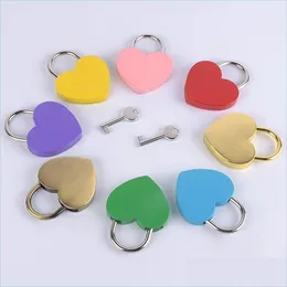 Party Favor Valentine Day 11 Colors Heart Shaped Concentric Lock Metal Mitcolor Key Padlock Gym Toolkit Package Door Loc Homeindustry Dhk46