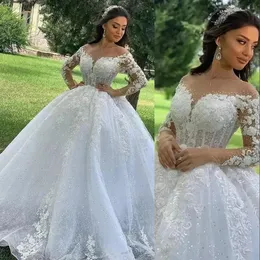 A Line Wedding Gowns Illusion Jewel Neck Long Sleeves Arabic Plus Size Puffy Princess Lace Appliques Crystal Beads Sequined Ball Gown Bridal Party Dresse