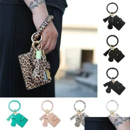 Nyckelringar Armig Key Chain Armband ID Kreditkortshållare Bangle PU Läderläppstift Keyring Plånbok med Tassel för kvinnor NewdhBest Dh9et