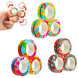 Giocattolo di decompressione Anello magnetico per dito Anello magnetico Giocattoli di agitazione Anelli colorati Ottimo per l'allenamento Allevia Riduttore di ansia per l'autismo Drop Deliver Mxhome Amzxy