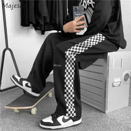 Pantalons pour hommes Patchwork à carreaux Hommes Pantalons décontractés High Street Harajuku Chic Designer Oversize Fashion Drapé Jogger Workout Pantalon droit T220909