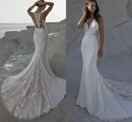 Abiti da sposa sexy a sirena da spiaggia scollo a V profondo applicazioni in pizzo fodere champagne corte strascico abiti da sposa bohémien realizzati su misura