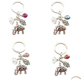 Schlüsselanhänger 1 stück Tribal Ethnische Schlüsselanhänger Einzigartige Böhmen Geschenk Schlüsselhalter Lotus Schmuck Hand Elefant Auto Schlüsselbund Für Frauen Drop Lieferung Dhhjn