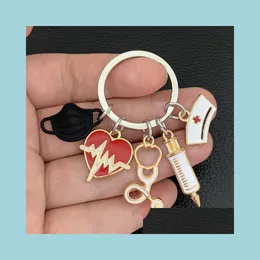 Anahtarlıklar Yeni Doktor Keychain Tıbbi Aracı Ana Zincir Kalp atışı Stetoskop Şırınga Hemşire Kapa Hediyesi DIY el yapımı mücevher damla Deli DHG1W