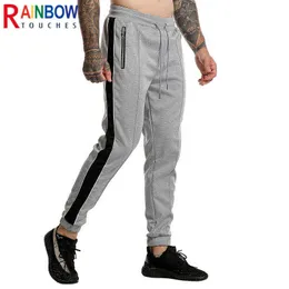 Pantaloni da uomo Rainbowtouches 2021 All Seasons Fitness Uomo Banda laterale Tasca con zip Matita Sport Pantaloni casual elastici Qualità superiore T220909