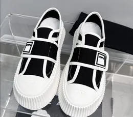 Lyxdesigner sneakers casual skor duk skor sned teknik hög låg topp sneaker tryckt alfabet kvinnor