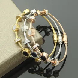 Bangle Designer المجوهرات الفولاذ المقاوم للصدأ الأسوار الرومانية العليا مع الماس للنساء سوار سوار القشرة بالأبيض والأسود قذيفة مغناطيسية 2024