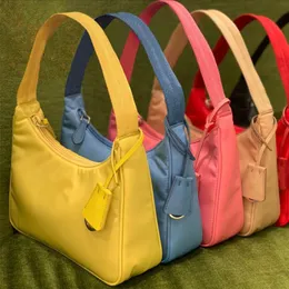 En kaliteli lüks tasarımcı omuz çantası tuval tote erkekler kadınlar gerçek deri çapraz gövde çantaları tote naylon moda kız hediye çanta çanta hobo vintage çanta prad