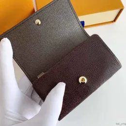 Luxurys designers nyckel pl￥nb￶cker kvinnor koppling h￥llare 6 metall h￤ngande sp￤nne nyckelring l￤der keybag mini mynt handv￤ska mode man med ruta 10 baiying