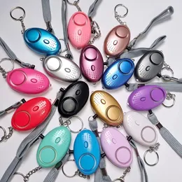 130dB ￤ggform Emergency Keychain Sj￤lvf￶rsvar S￤kerhetslarm f￶r flickor Kvinnor ￄldre skyddar varning S￤kerhet Skrik h￶g nyckelring med LED -ljus