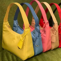 En kaliteli lüks tasarımcı omuz çantası tuval tote erkekler kadınlar gerçek deri çapraz çantalar tote naylon moda kız hediye çanta çanta hobo vintage çanta prad