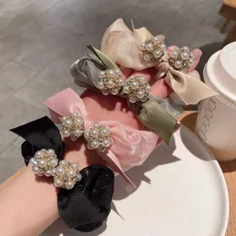 Lüks parlayan rhinestone kristal saç yüzüğü ipi moda saç aksesuarları kadınlar inci yay yüksek elastik bant scrunchies kız yeni