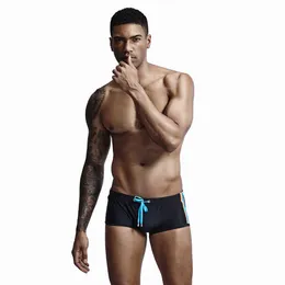 Herrbadkläder strand laceup rep boxer sexig solid färg nära passformar surfing shorts försäljning sunga gay j220913