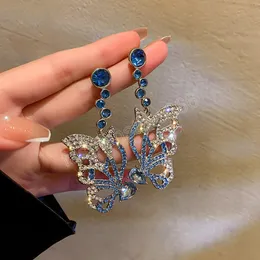 Orecchini pendenti con ali di farfalla Personalità della moda europea e americana Orecchini di cristallo blu Regali di gioielli da donna