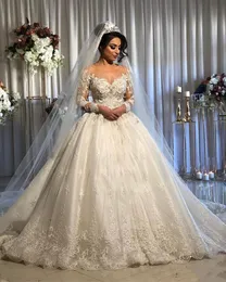 Arabic Dubai Princess Wedding Dresses Lace Bridal Gowns Appliques Beaded Sheer Jewel Neck Long Sleeves Ivory Tulle A-Line Robe De Mariage 2022