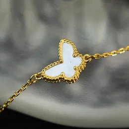 18k gold mini butterfly white mother necklace female senior sense clavicle chain pendant ins niche grey bell nail bracelet