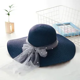 ボールキャップスプリングXia Maozi Widewide Brim Hat Korean Straw Color Pearl Foldable Outdoors Sandy Beach Sunscreen Sun Hatball