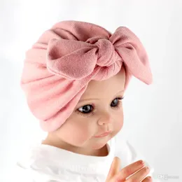 Stickad nyfödd baby flickor sjukhus hatt med båge baby pojkar turban hatt spädbarn kanin bowknot mössor wrap moft bebes stickade skalle