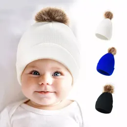 القبعات الشتوية في فصل الشتاء الجديد الفتاة الفتيات دافئة الأطفال القبعة المحبوكة الموضة متعددة الاستخدامات كرة قبعة صغيرة من الصوف 0-2 سنة