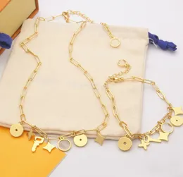 2022 Smycken Kvinna guldfärg metall charm armband halsband titan stål hänge halsband