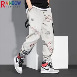 Męskie spodnie Rainbowtouchs sport luźne trening spodni Męscy Hip Hop Graffiti Fashion Casual Printing Cropped Cargo 220827