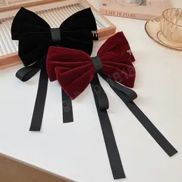 Mulher feminina BOWS VELVET CAICLIP ELEGENTE ELEGENTE BIG BOWKNOT SOLID BARRETtes Clipe de rabo de cavalo para meninas Casual Casual