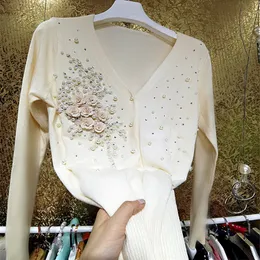 Maglia da donna T-shirt Autunno Lusso Perline Cardigan lavorato a maglia Donna Industria pesante Perla di cristallo lucido 3D Fiore Maglione Outwear 221206