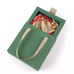 Papperslåda smyckeslåda med handtag för bärbara ringörhängen halsband smycken förpackning arrangör fodral